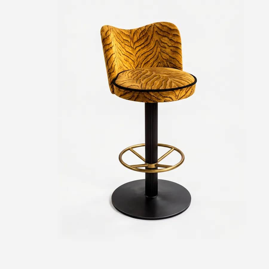 Panthera Barstool barstool — fluted column and round base in electroplated matte black with a footrest ring in electroplated brass-aged, upholster…