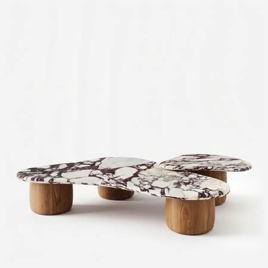 Tallis Coffee Table coffee table — walnut wood feet in a natural finish, short and rounded, carrying two pebble-shaped tops in Calacatta Viola marble se…