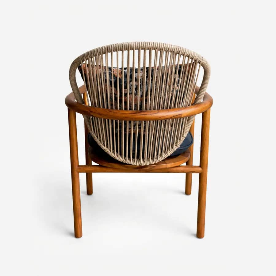 Alen dining chair — a relaxed outdoor lounge chair with a solid teak wood frame, oiled for durability, featuring an aluminum backrest wra…