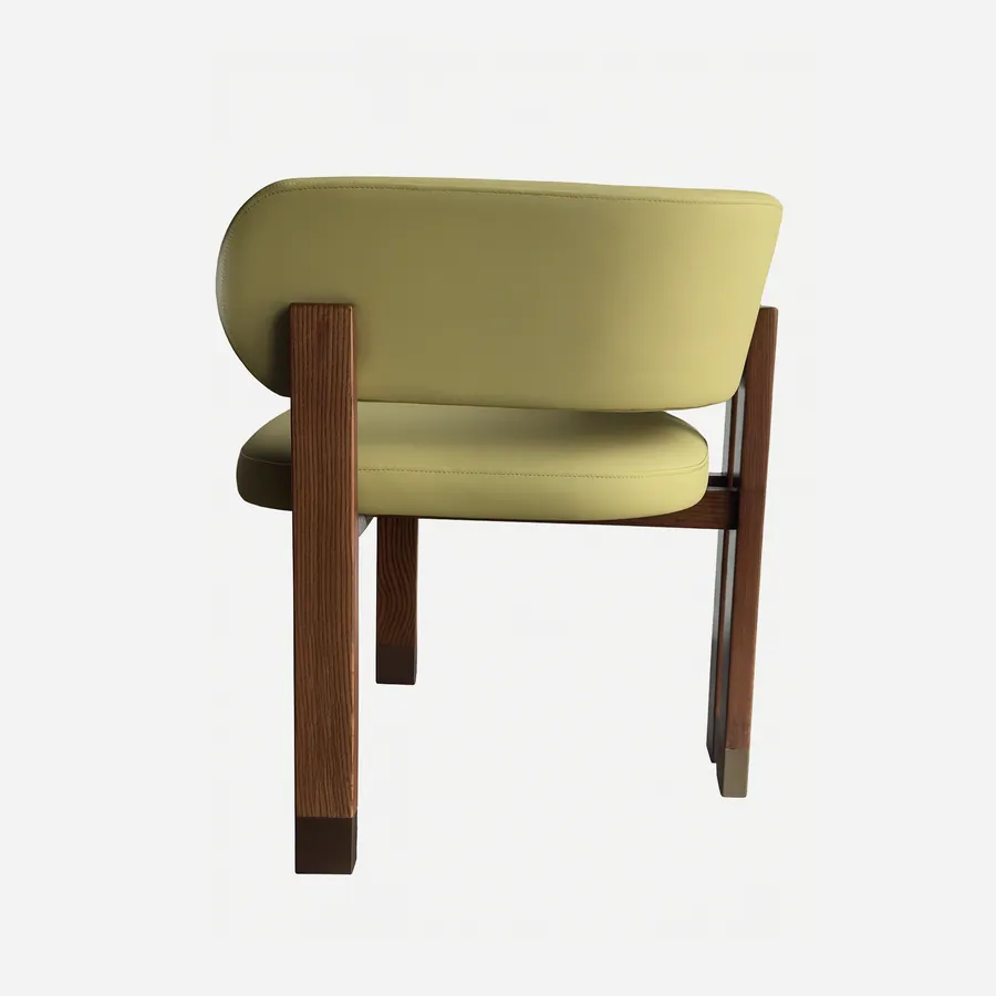 Beirut Dining Chair dining chair — solid ash wood frame in a walnut stain with an upholstered artificial leather seat and back