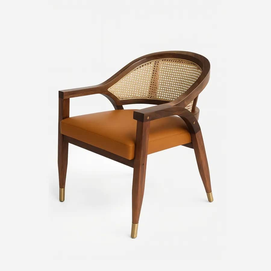 Valencia Dining Chair dining chair — the seat is upholstered in real leather, while the back features synthetic rattan