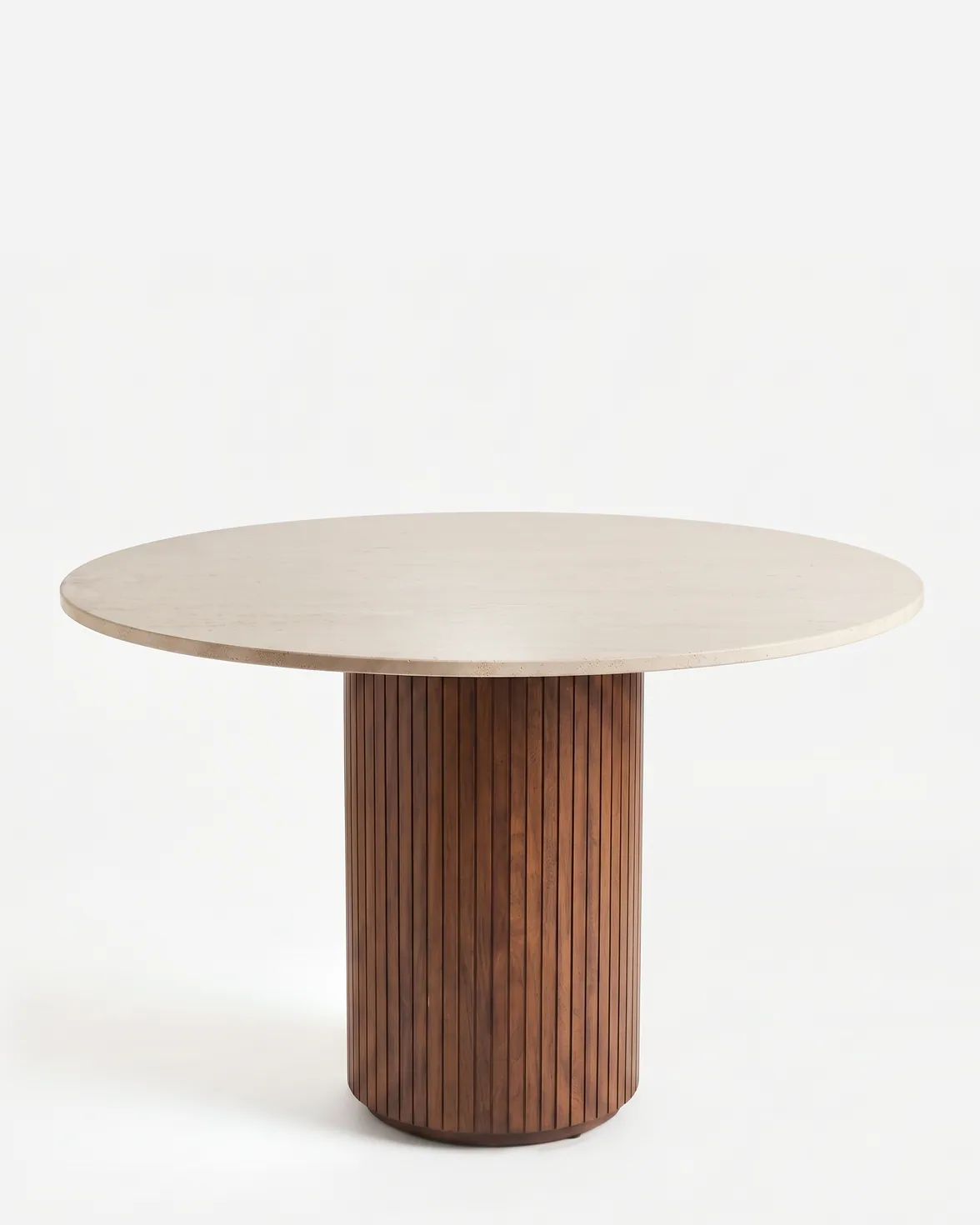 Bari Dining Table dining table — iroko wood in a walnut stain forms the wide drum base, clad in vertical fluted slats on a recessed plinth, beneath a…