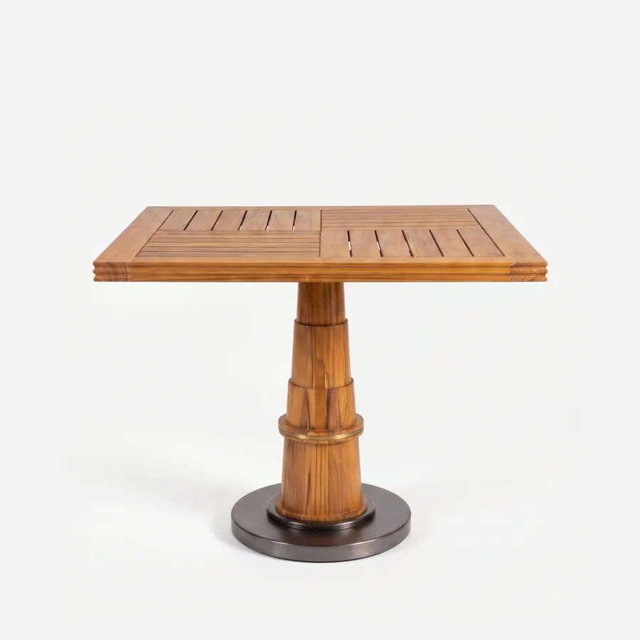 Kian Dining Table dining table — teak wood top laid in four slatted quadrants with a stepped moulded edge, on a turned column with a brass-aged band o…