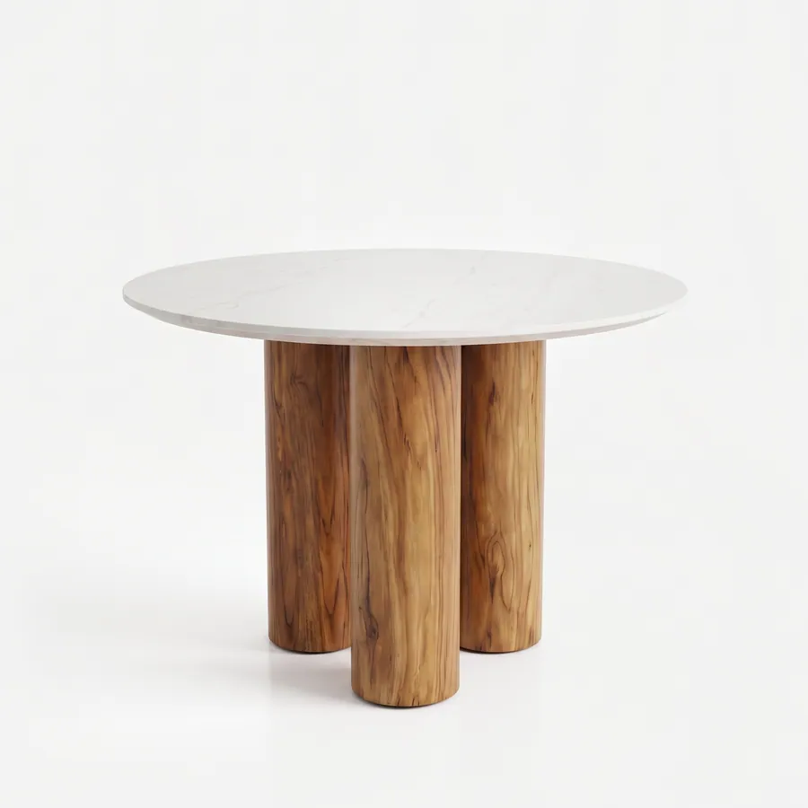 Liran Dining Table dining table — iroko wood in three cylindrical legs gathered closely beneath the centre, supporting a round Carrara marble top with…