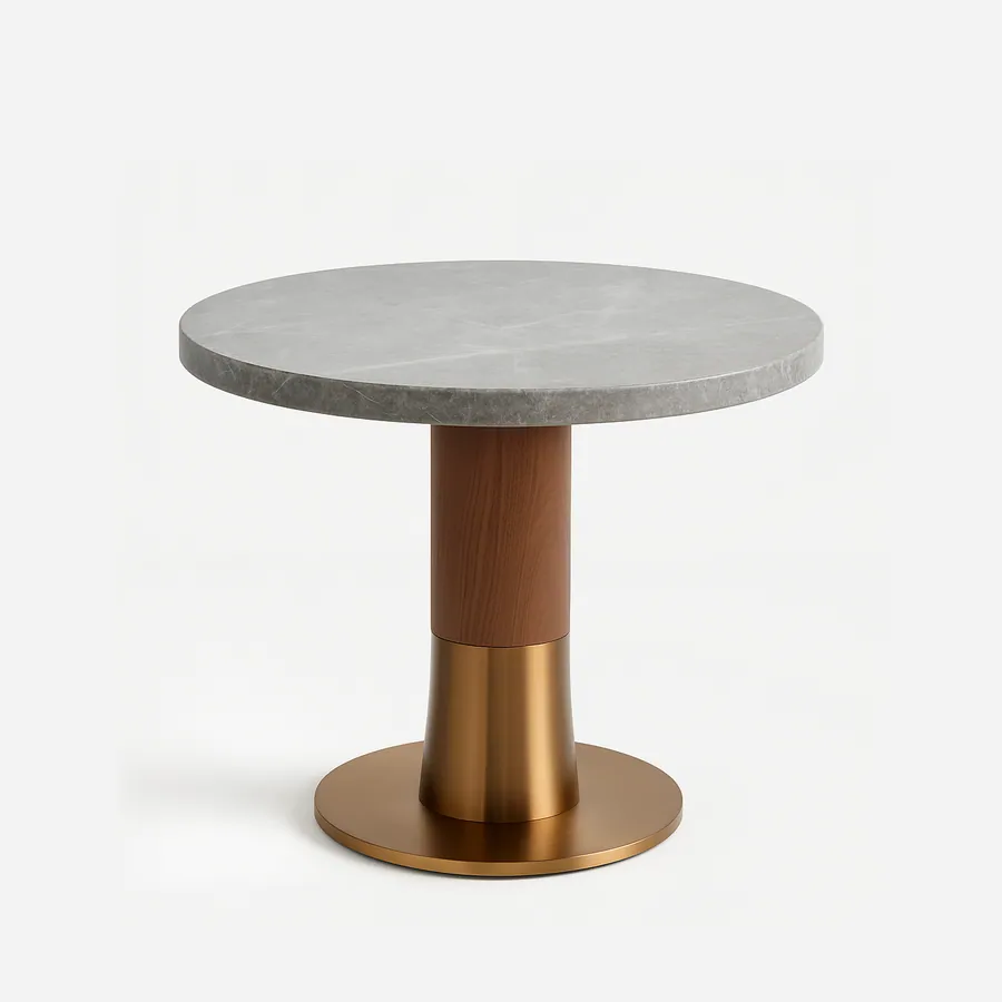 Soria dining table — a round grey marble tabletop with a smooth, honed finish rests on a sculpted column base combining solid wood with a…
