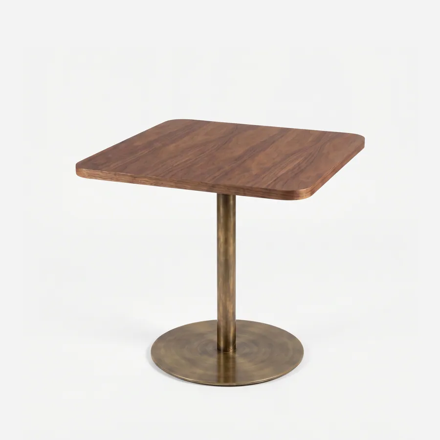 Tova Dining Table dining table — walnut wood square top in a natural finish with softly rounded corners, set on a slim column and round base plate in…