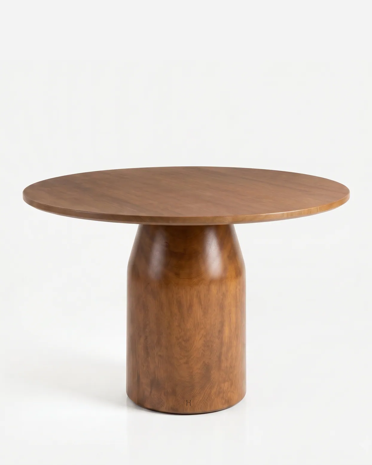 Verona Dining Table dining table — iroko wood in a walnut stain, with a slim round top on a single wide pedestal whose cylindrical column has softly rou…