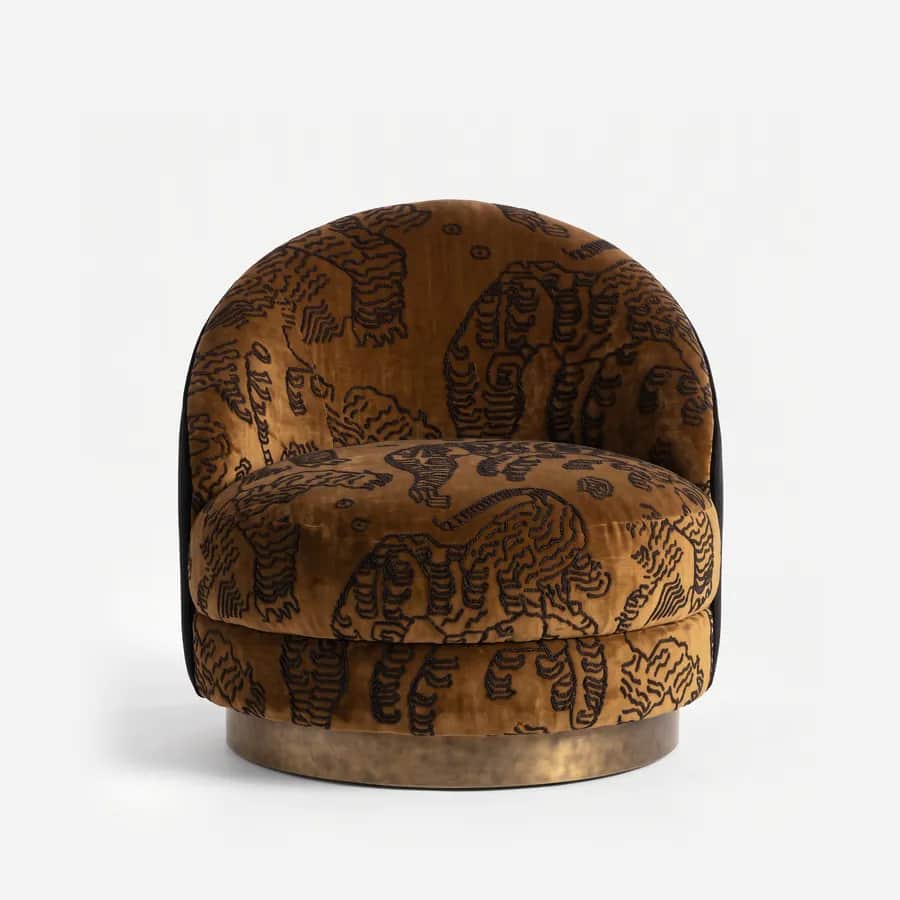 Haven Lounge Chair lounge chair — circular plinth in electroplated brass-antique, with the inner shell and seat in pattern velvet and the outer back in…