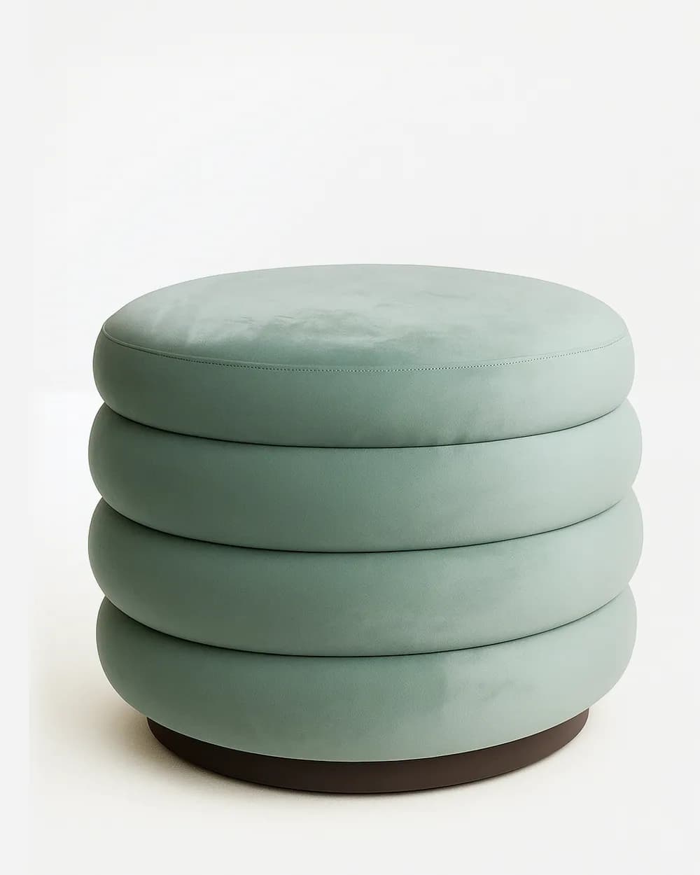 Miro Pouf pouf — a fully upholstered pouf with layered, rounded cushioning and a solid base