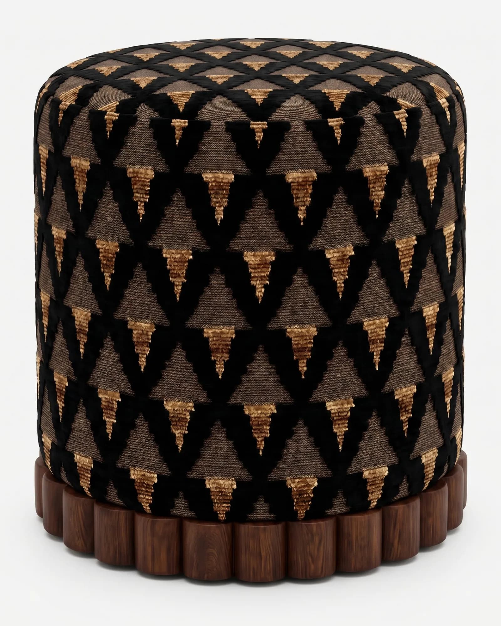 Vela Pouf pouf — walnut wood scalloped, fluted base beneath a cylindrical body upholstered in pattern velvet, with a black triangular…