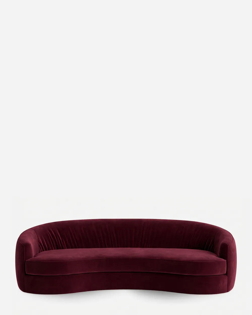 Emere Sofa sofa — curved sofa fully upholstered in velvet, with a rounded back wrapping into the sides, a gathered inner back and a lon…