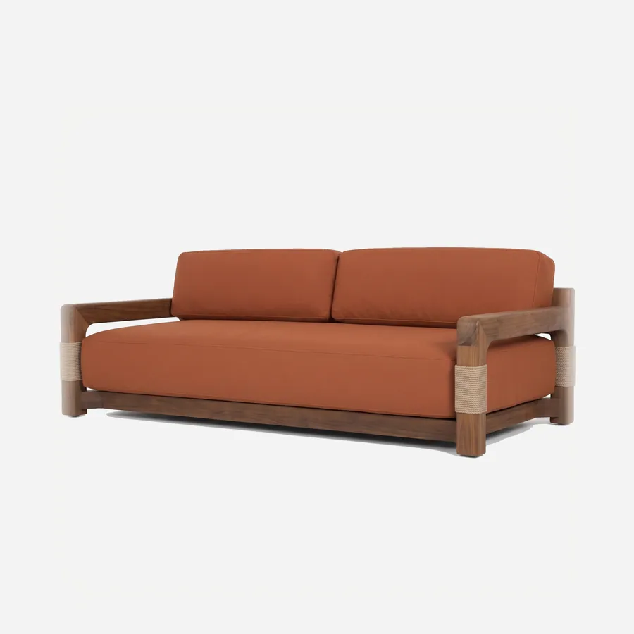 Gideon Sofa sofa — iroko wood frame in a walnut stain with a stacked rail back and open box arms, the corner posts wrapped in woven rope…