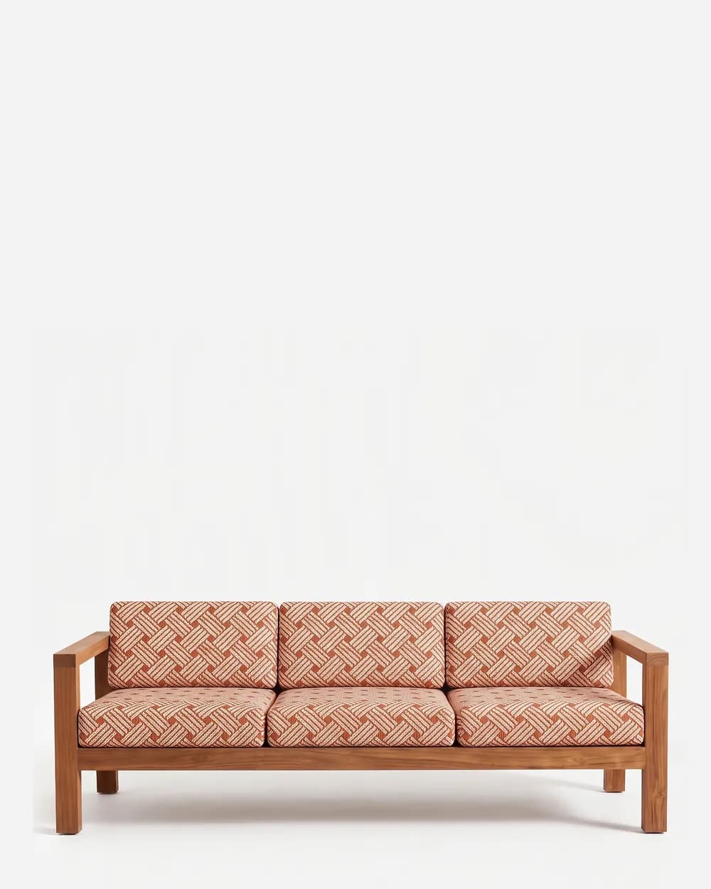 Talia Sofa sofa — teak wood frame with open slatted arms and a horizontally slatted back, set on square legs, with three loose seat and…