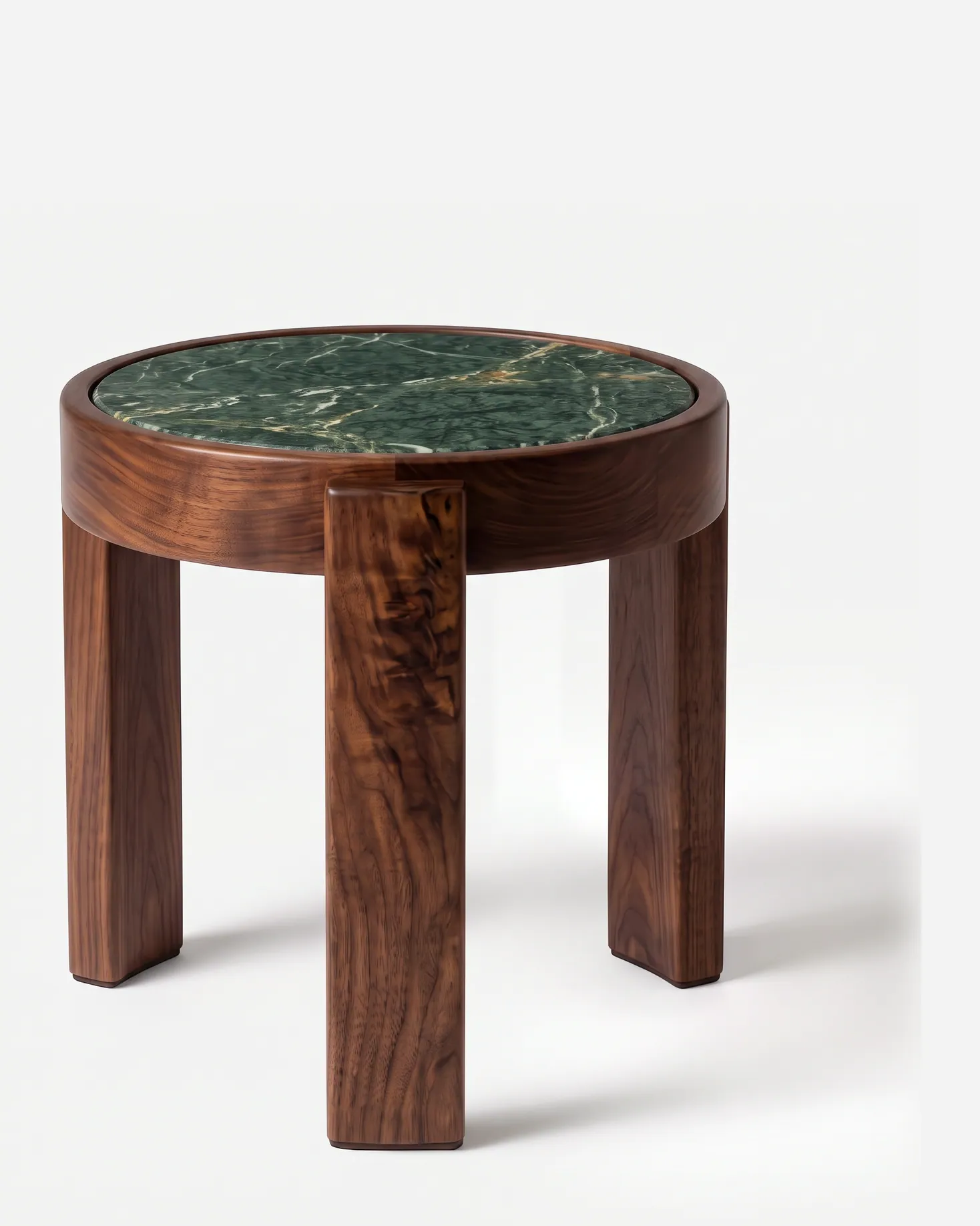 Caspian Side Table side table — walnut wood frame in a natural finish, with three broad, flat legs wrapping up around a round ring that holds an inse…