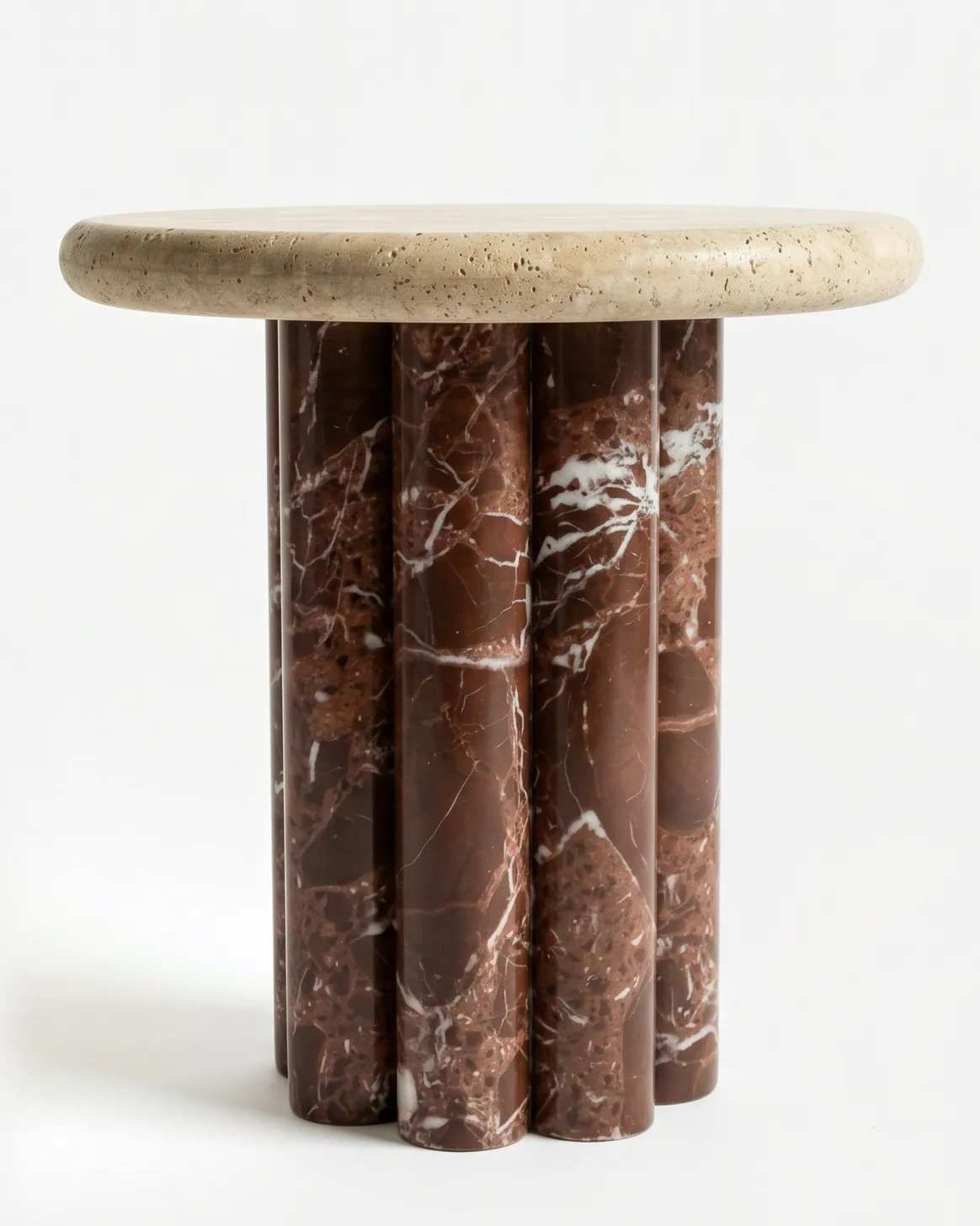 Liora Side Table side table — beige travertine round top with a softly rounded edge, resting on a base of clustered cylindrical columns in Rosso Le…