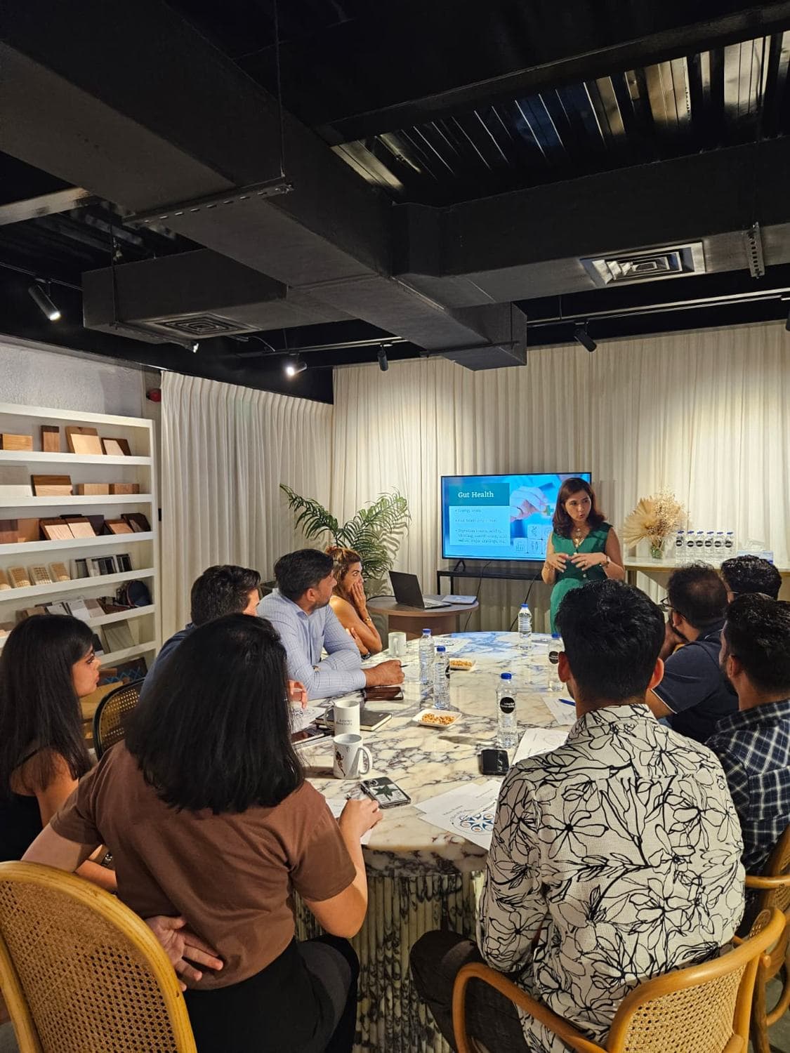 A workshop around a marble table in the showroom