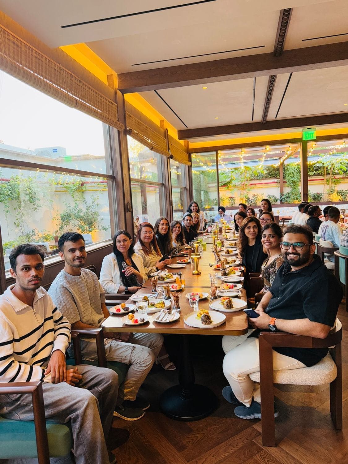 The team at a long dinner table
